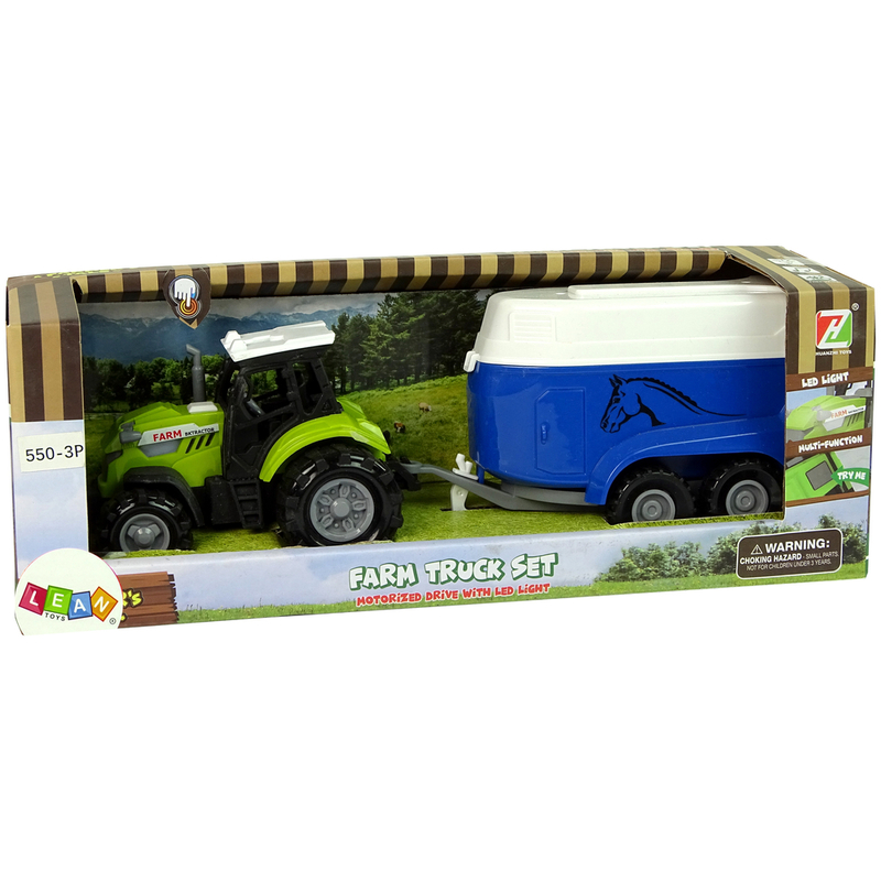 Roheline traktor sinise hobuse haagisega
