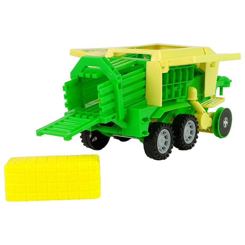 Roheline traktor pressi hõõrdeajamiga