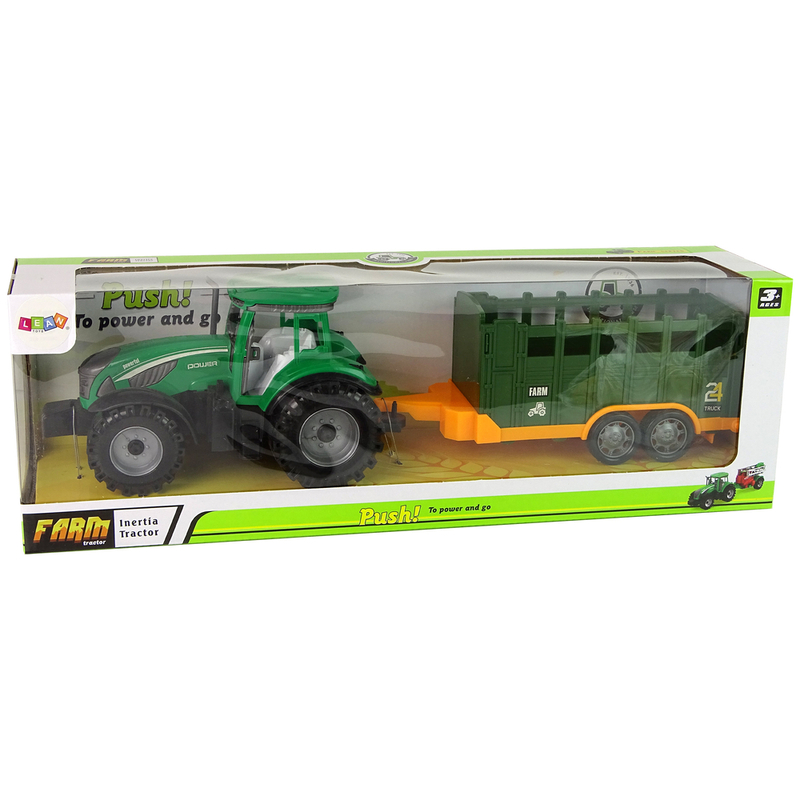 Roheline traktor koos eemaldatava hõõrdetõmbega haagisega
