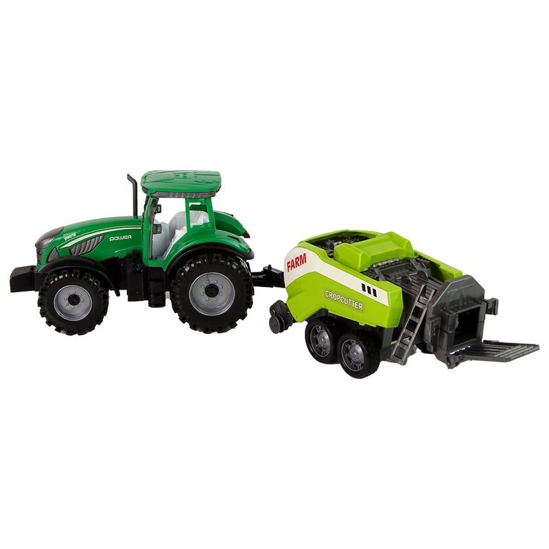 Roheline traktor, millel on eemaldatav hõõrdekettaga puur