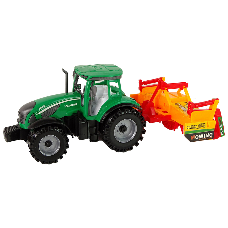 Roheline traktor koos oranži kultivaatoriga