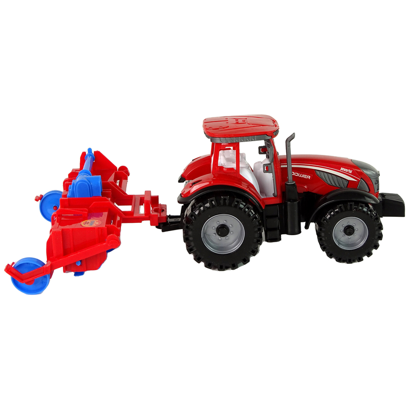 Punane traktori künnisvõlli ajamiga traktoritraktor